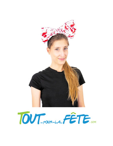 Serre tête noeud blanc ensanglanté